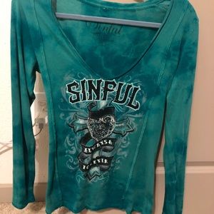 Love this shirt just runs tad big feels like M